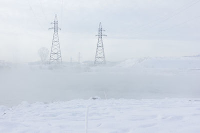 Transmission of electricity near the city in the winter season