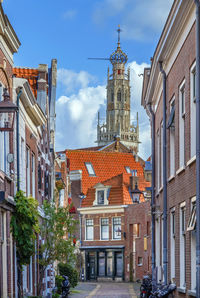 Low angle view of buildings against sky in city