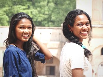 Portrait of smiling teenage girls