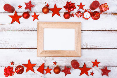 View of christmas decorations on wooden floor