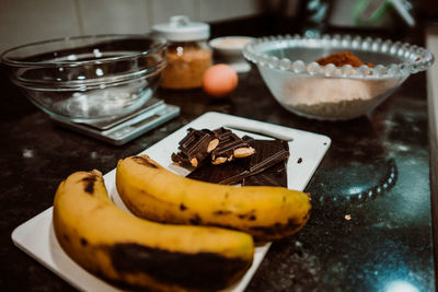 Close-up of fruits in plate on table