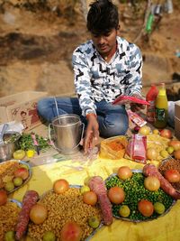 Man selling food in market