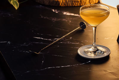 Close-up of wineglass on table