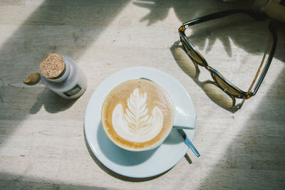 High angle view of coffee on table