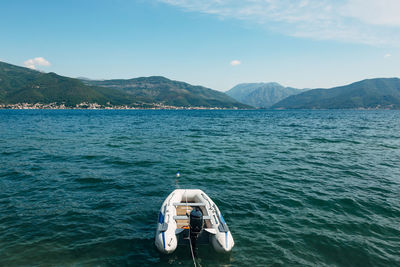 View of sea against mountains