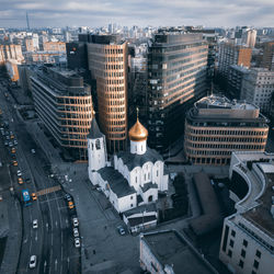 High angle view of buildings in city against sky