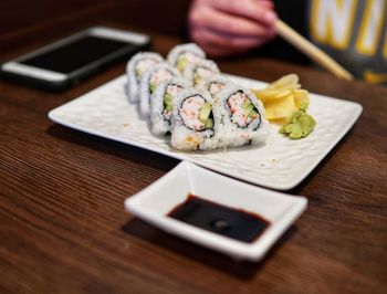 Close-up of sushi served on table