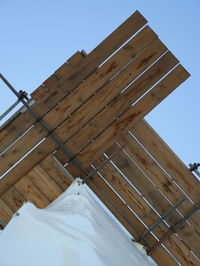 Low angle view of snow against sky