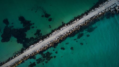 High angle view of swimming pool by sea