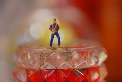 Close-up of figurine on table