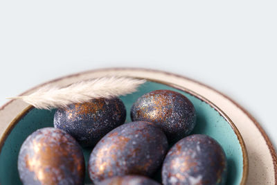 Close-up of fruits in bowl on table