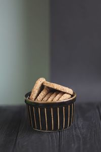 Close-up of basket in bowl on table