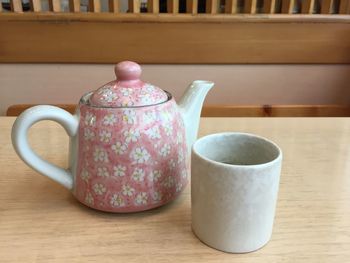 Close-up of coffee cup on table