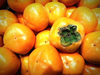 Full frame shot of persimmon in market