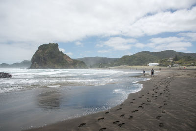 Scenic view of beach against sky