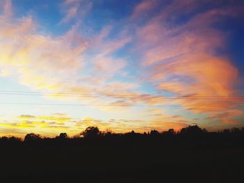 Scenic view of silhouette landscape against sky during sunset