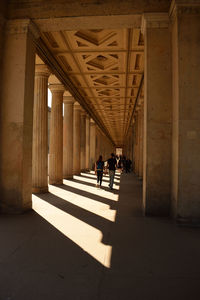 People walking in corridor