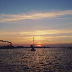 Scenic view of sea at sunset