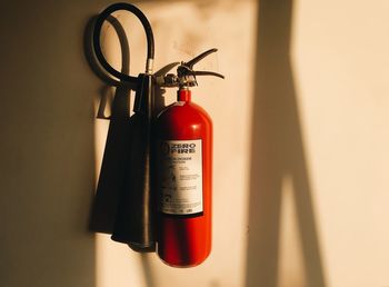 Close up of fire extinguisher on wall