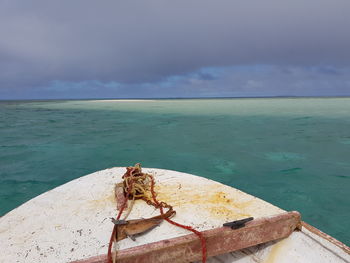 Boat in sea against sky