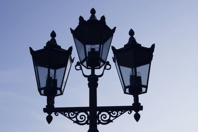 Low angle view of street light against clear sky