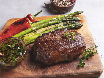 High angle view of vegetables on cutting board