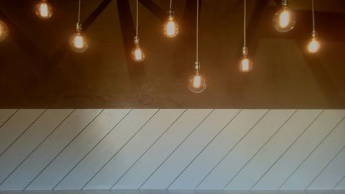 Close-up of illuminated light bulb