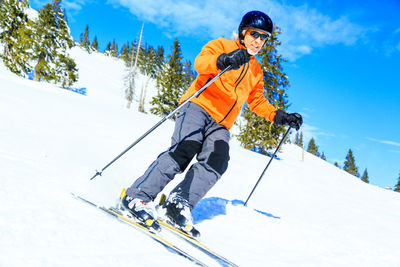 Low angle view of ski lift against sky