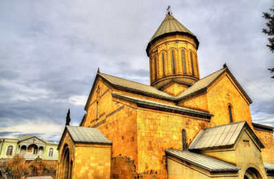 Low angle view of traditional building against sky