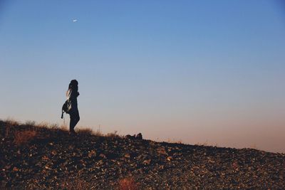 Woman standing on landscape