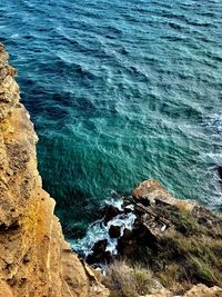 High angle view of rocks on beach