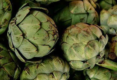 Full frame shot of fresh green artichokes at market