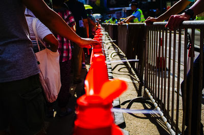 People standing on street in city