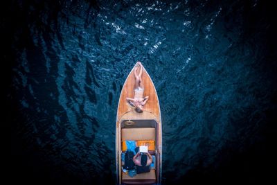 High angle view of mobile phone in sea