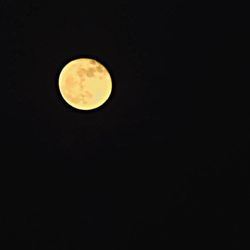 Low angle view of moon in sky