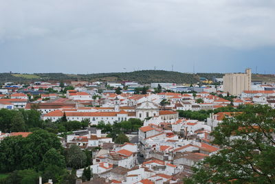 View of residential district against sky