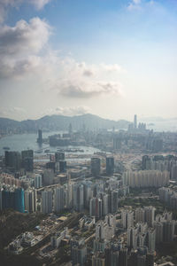 High angle view of buildings in city against sky