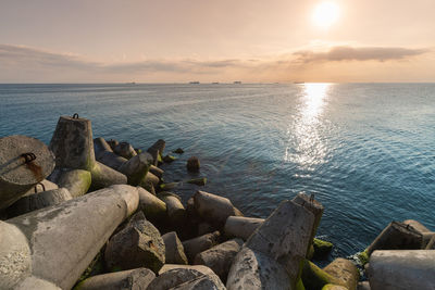 Scenic view of sea against sky during sunset