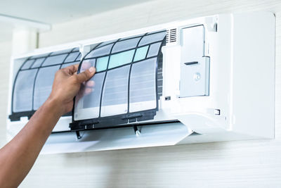 Cropped image of person using computer