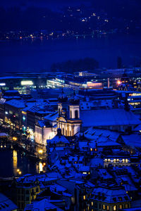 High angle view of illuminated buildings at night