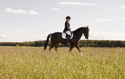 Woman horseback riding