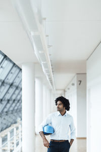 Young man looking at camera