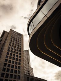 Low angle view of modern buildings against sky