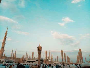 Panoramic view of buildings in city against sky