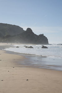 Scenic view of beach against sky