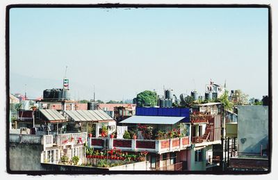 Buildings against clear sky