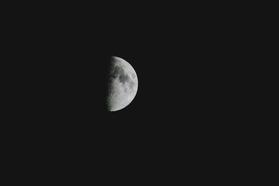 Low angle view of moon against sky at night