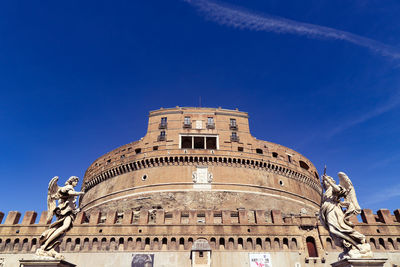 Low angle view of historical building against blue sky - st. angel castel