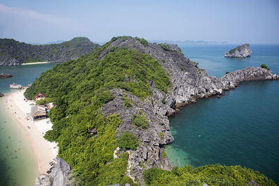 High angle view of rocks on beach against sky