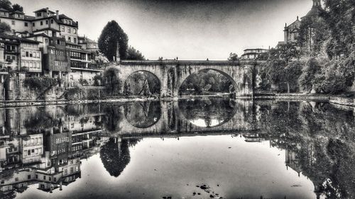 Arch bridge over river